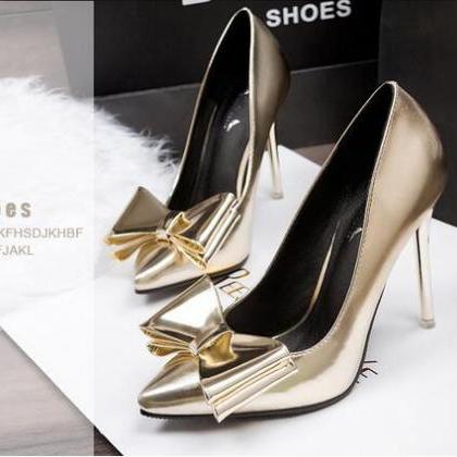 Pointed Toe Metallic High Heel Pumps Adorned With..